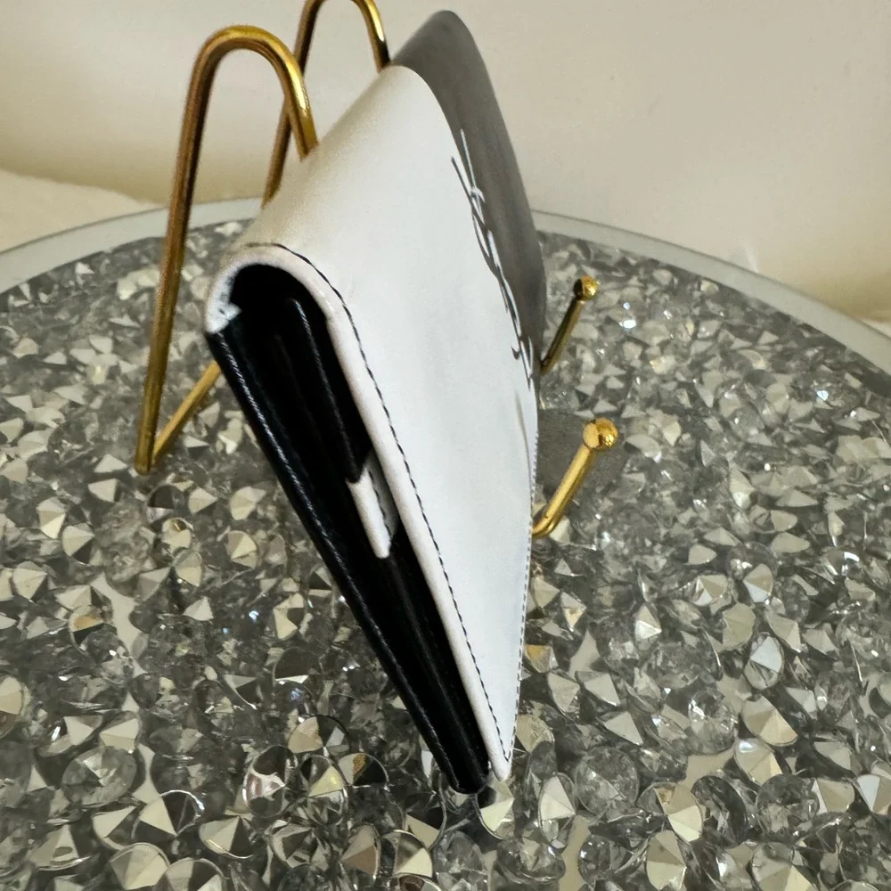 Yves Saint Laurent Black and White Bicolor Leather Continental Wallet - Picture 2 of 12